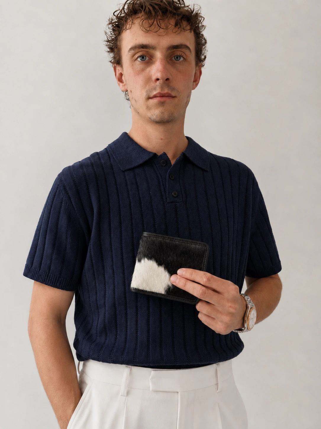 SAVI wallet held in hand